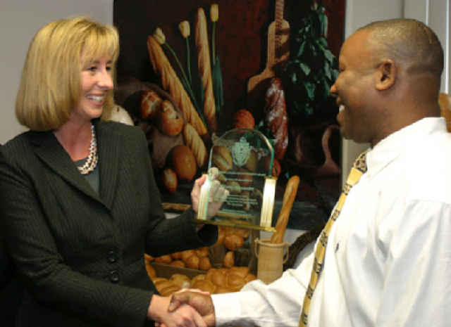 Healey shaking hands